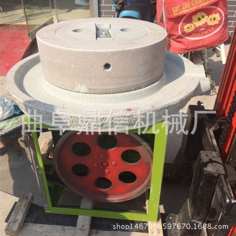 河北玉米煎餅?zāi)ズ龣C(jī) 商用石磨豆?jié){機(jī) 電動(dòng)石磨生產(chǎn)廠家
